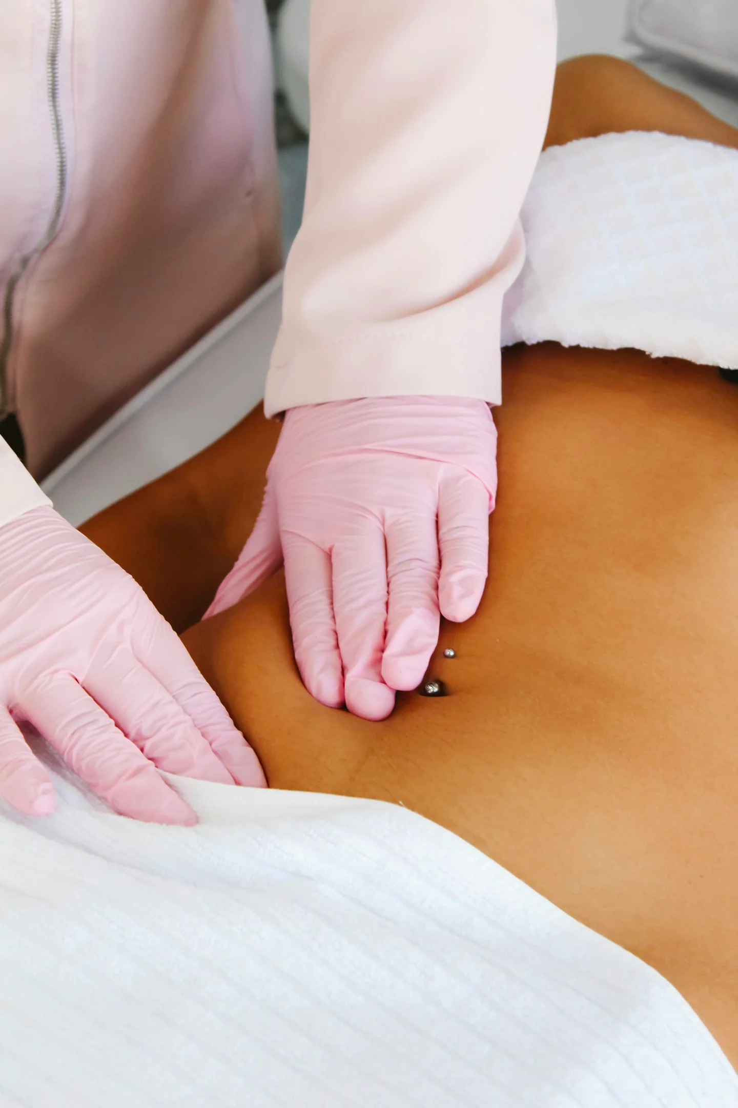 Woman receiving a back massage at a spa